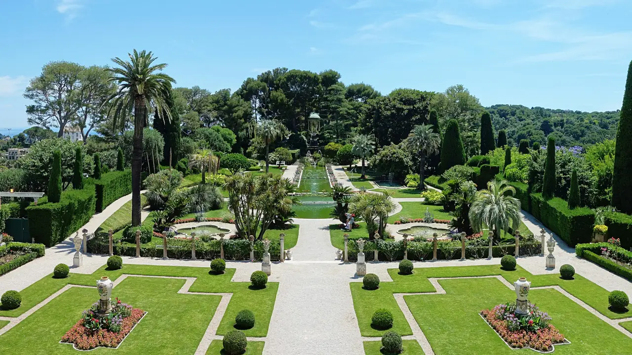Central axis, water canal and symmetrical parterres in the formal garden of the Villa Ephrussi de Rothschild